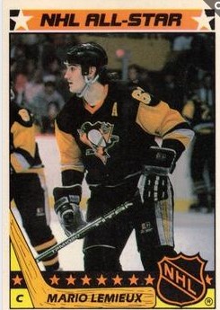 1987-88 Topps Stickers 11a   AS,VAR: One asterisk (*) before copyright on back recto